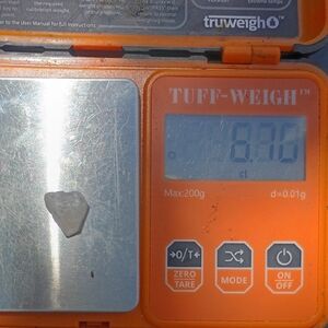 Elegant Orange and Silver Ring with Intricate Design